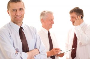 nine-qualities-employers-seek-three-business-men_two-in-background