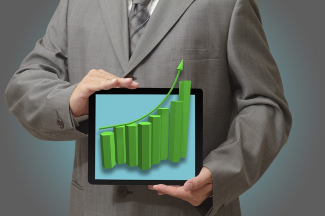 Presentation Skills - Man Holding Device Screen with Chart